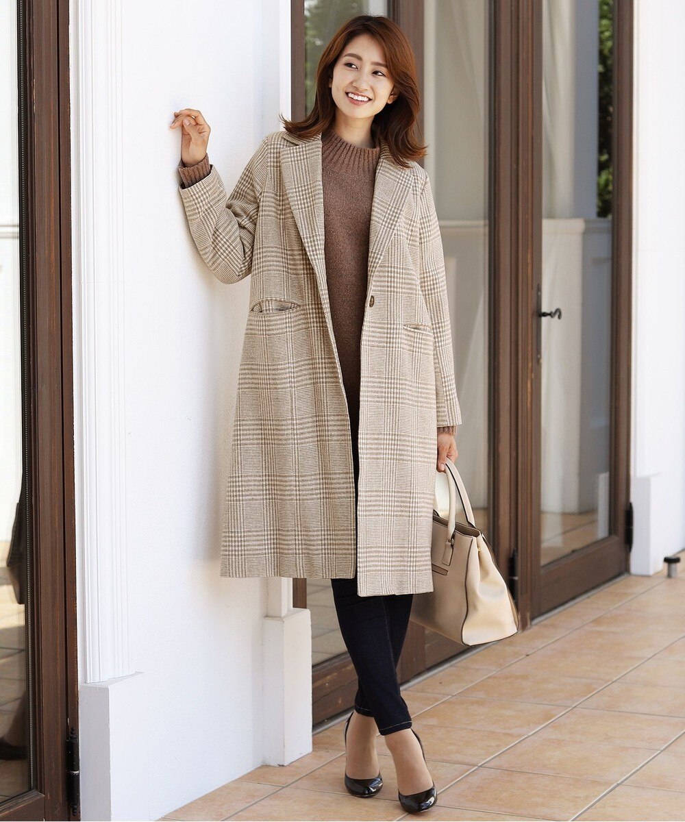 幅広く活躍が期待できるチェック柄チェスターコート