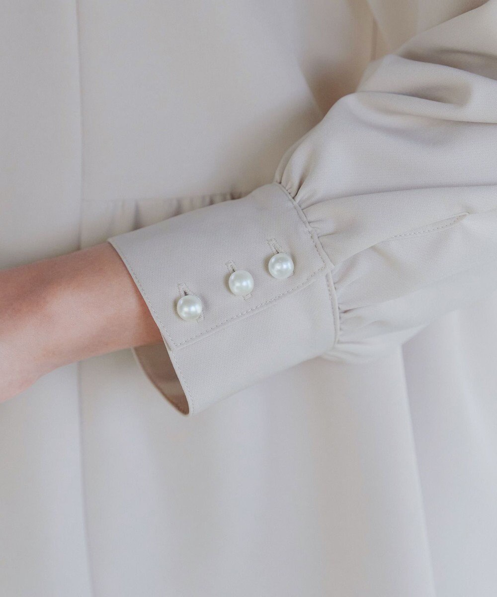 Tiaclasse 【ダブルクロス】パフスリーブペプラムチュニックブラウス 