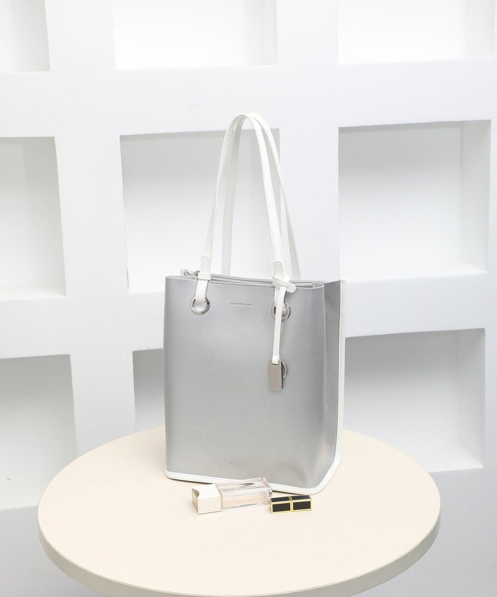 style code 【MERCURYDUO/マーキュリーデュオ】メタルアイレット　縦長トートバッグ 推し活ラージバッグ 縦長ショルダーバッグ 
