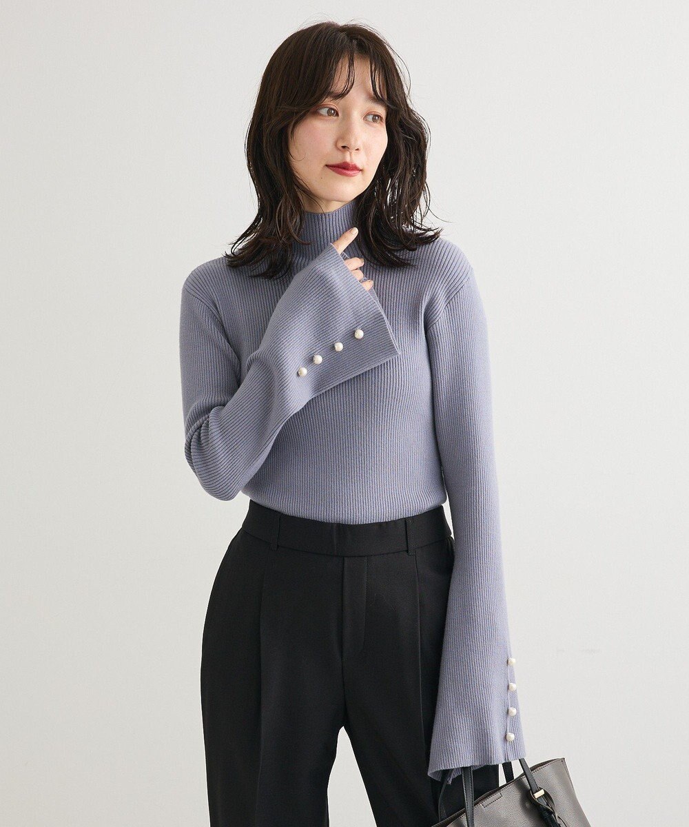 Green Parks ・ｓｗｉｎｇ　ｂｙ　袖パールボタンフレアリブニット 