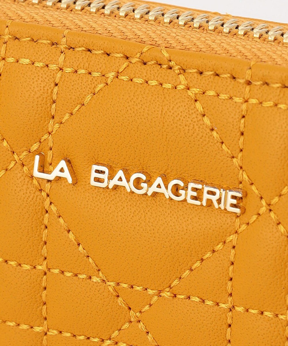 LA BAGAGERIE シープキルティング　ラウンドウォレット 