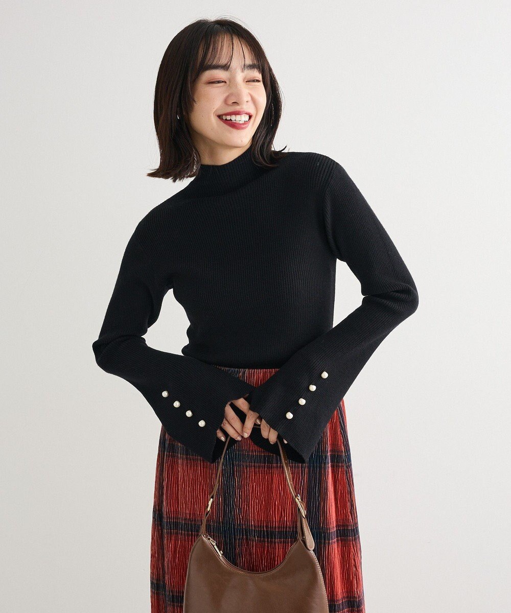 Green Parks ・ｓｗｉｎｇ　ｂｙ　袖パールボタンフレアリブニット 