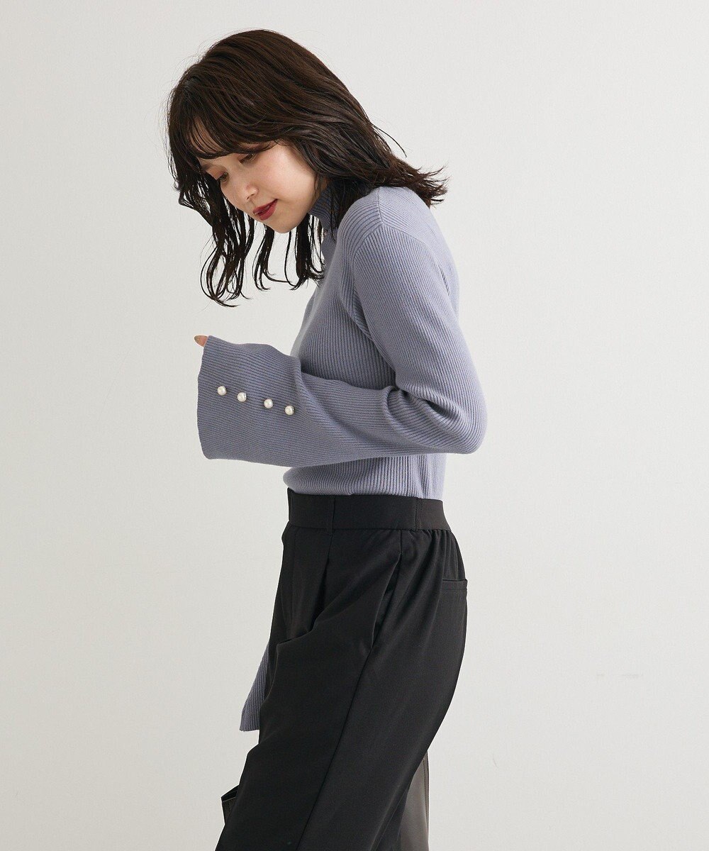 Green Parks ・ｓｗｉｎｇ　ｂｙ　袖パールボタンフレアリブニット 