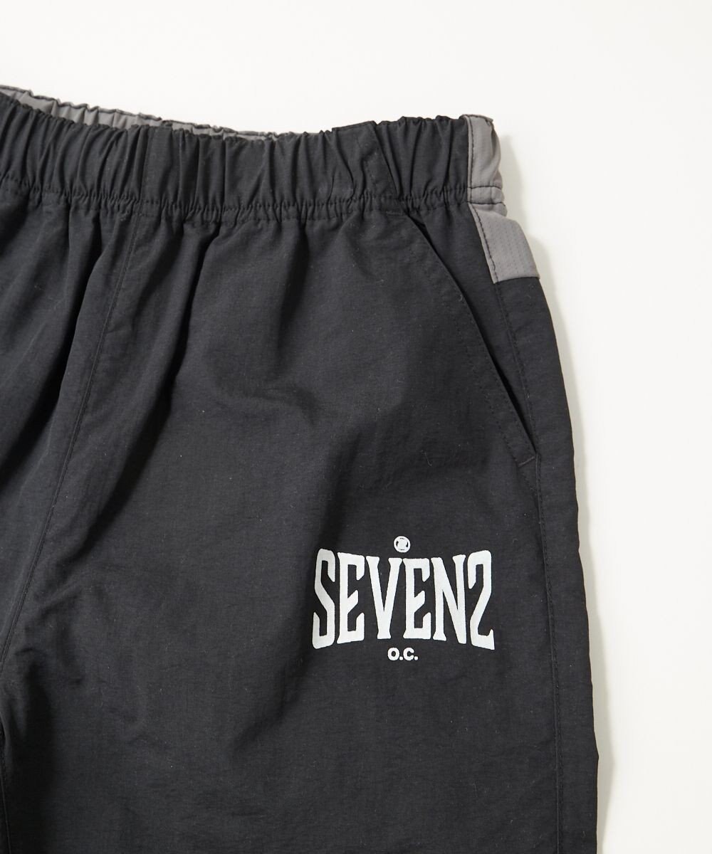 OP／FILA 【SEVEN2】異素材切替ナイロンパンツ 
