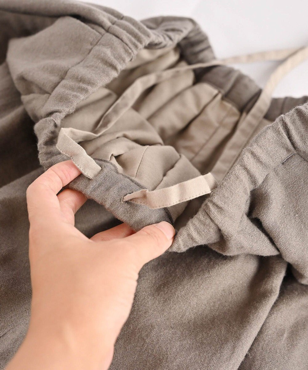 muuc リネンウールの裾タックワイドパンツ 