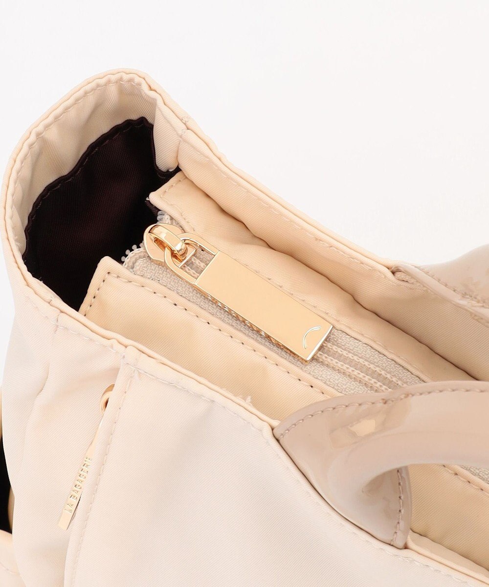 LA BAGAGERIE ツイルナイロン×エナメル リュックサック 