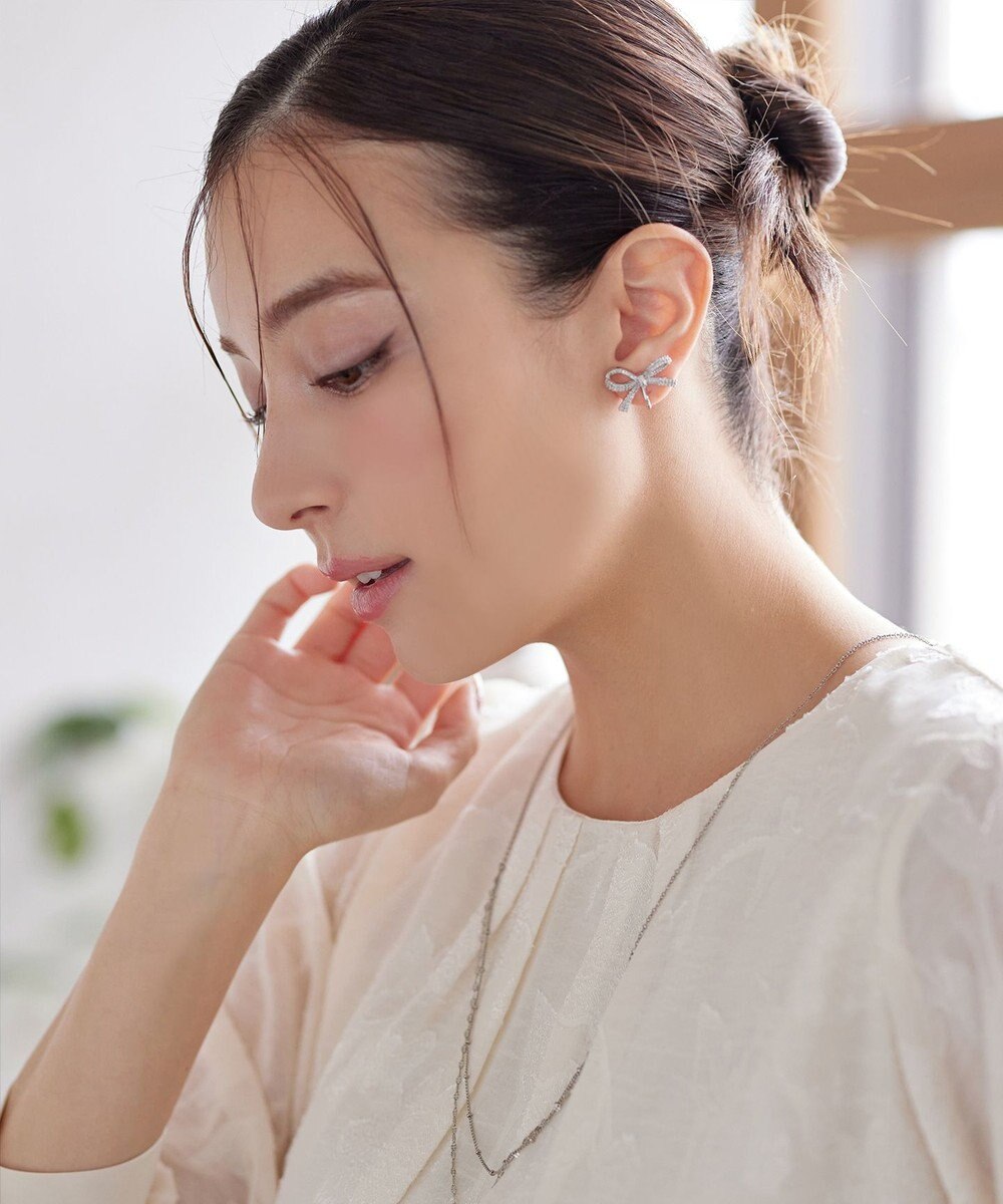 Tiaclasse クリスタルリボンイヤリング 