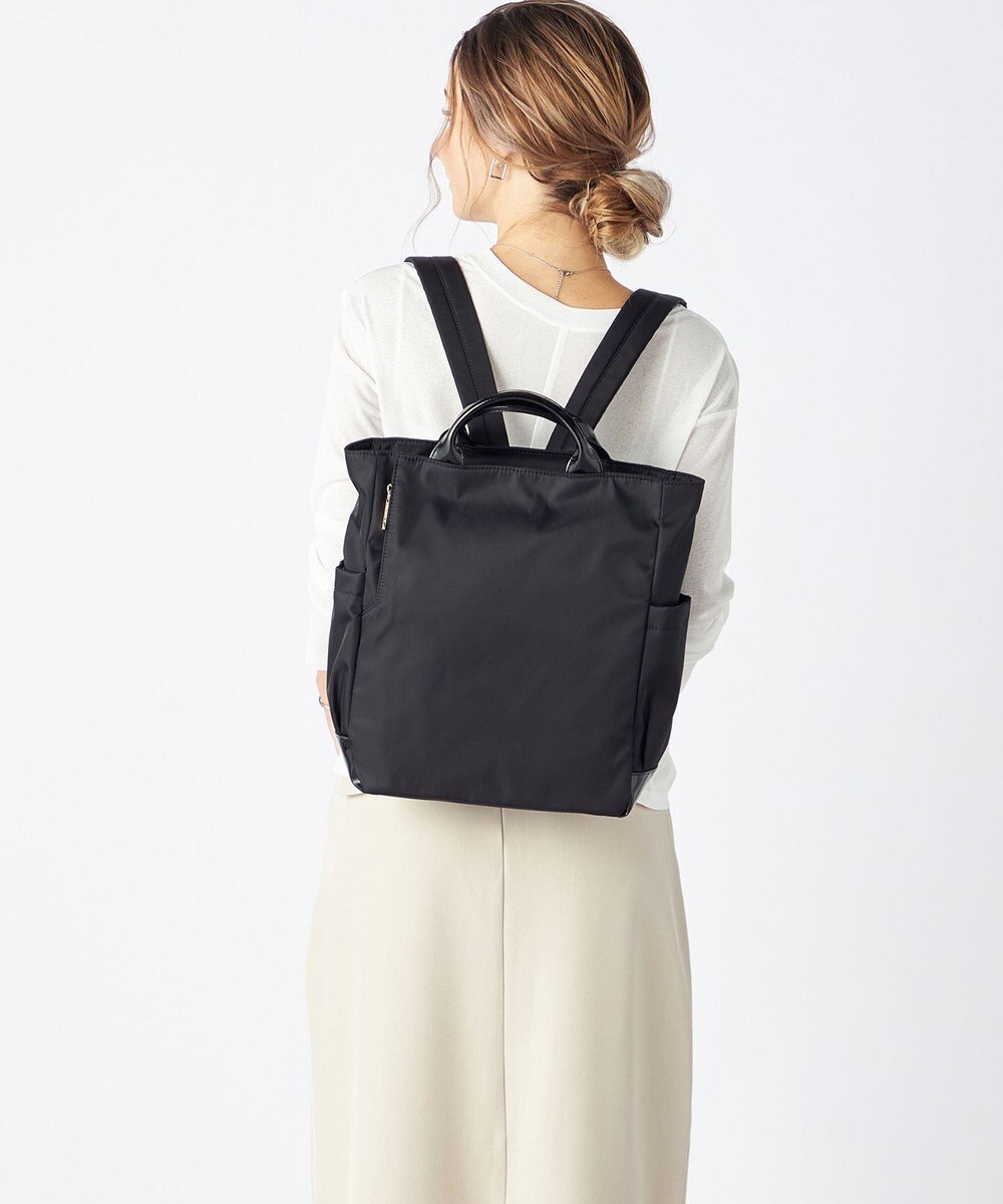 LA BAGAGERIE ツイルナイロン×エナメル リュックサック 
