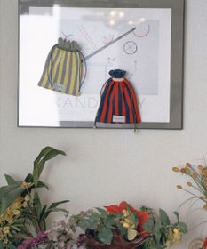 TRICOTE ストライプシャギーミニポーチ