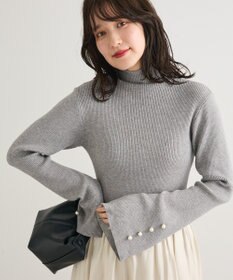 Green Parks ・ｓｗｉｎｇ　ｂｙ　袖パールボタンフレアリブニット