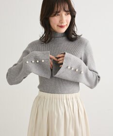 Green Parks ・ｓｗｉｎｇ　ｂｙ　袖パールボタンフレアリブニット