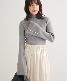 Green Parks ・ｓｗｉｎｇ　ｂｙ　袖パールボタンフレアリブニット