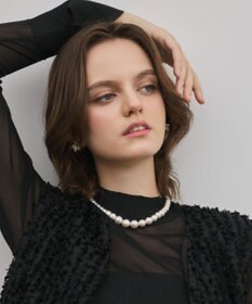 GRACE CONTINENTAL カットジャガードペプラムジレ