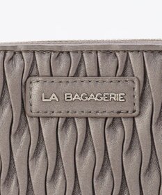 LA BAGAGERIE シープレザープリーツ加工ラウンドウォレット