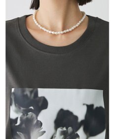 Green Parks レトロフラワーロゴ入りプリントＴシャツ