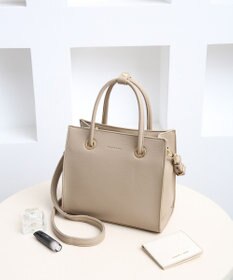 style code  【MERCURYDUO/マーキュリーデュオ】メタルアイレット　両アオリポケット　スクエアハンドバッグ