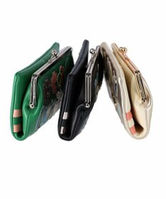 tsumori chisato CARRY tcパッチワーク がま口 長財布