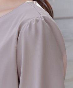 Tiaclasse ネックレス風チャーム付き裾バルーンブラウス