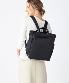 LA BAGAGERIE ツイルナイロン×エナメル リュックサック