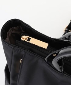 LA BAGAGERIE ツイルナイロン×エナメル リュックサック