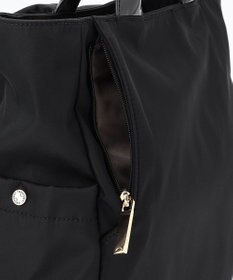 LA BAGAGERIE ツイルナイロン×エナメル リュックサック