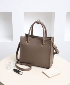 style code  【MERCURYDUO/マーキュリーデュオ】メタルアイレット　両アオリポケット　スクエアハンドバッグ