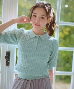 胸元刺繍ケーブルポロ ニット