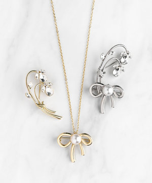 RIBBON&FLOWER BROOCH NECKLACE 2セット ブローチネックレス