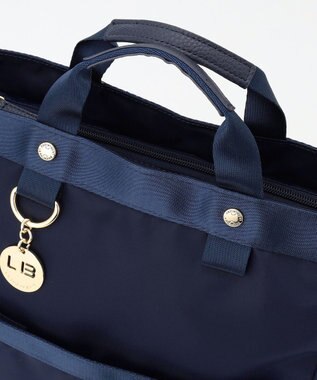 LA BAGAGERIE チャーム付き　ナイロンリュック ネイビー