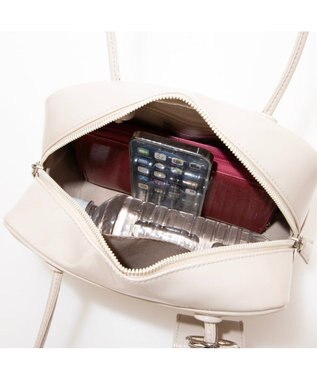 UNBILLION カシュカシュ cachecache / エナメル調中型ボストン アイボリー