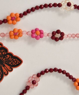 ANNA SUI ASスリング スマホストラップ アカ