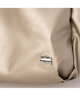 LA BAGAGERIE モノグラムデイリーバックパック ゴールド