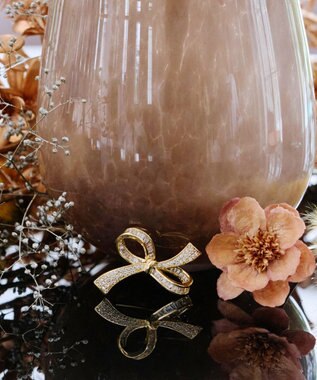 Tiaclasse   リボンモチーフブローチ ゴールド