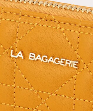 LA BAGAGERIE シープキルティング　ラウンドウォレット マスタード