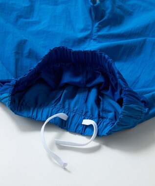 OP／FILA 【SEVEN2】異素材切替ナイロンパンツ ブルー