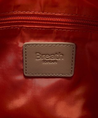 TOPKAPI 【Breath TOPKAPI】Freely フリーリー ナイロン ロゴテープ  ラウンド ショルダーバッグ オレンジ