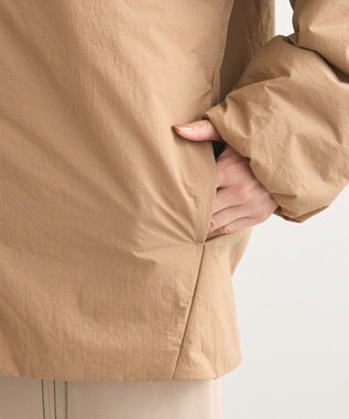 Green Parks シームレスライト中わたノーカラーブルゾン Camel