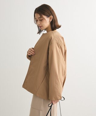 Green Parks シームレスライト中わたノーカラーブルゾン Camel