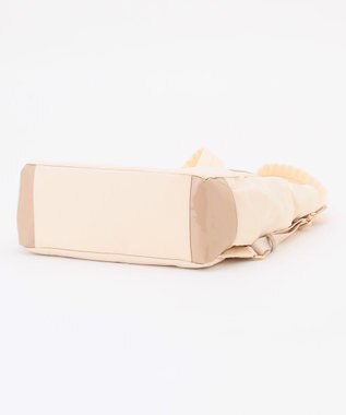 LA BAGAGERIE ツイルナイロン×エナメル リュックサック アイボリー