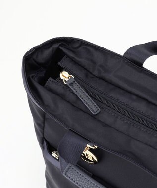 LA BAGAGERIE チャーム付き　ナイロンスクエアリュック ネイビー