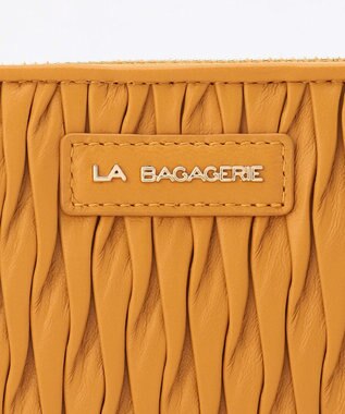 LA BAGAGERIE シープレザープリーツ加工ラウンドウォレット マスタード