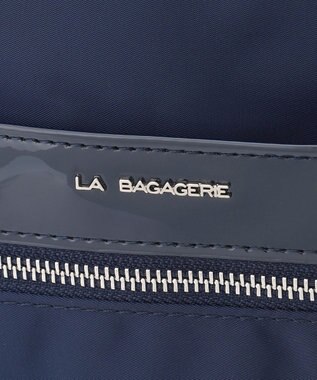 LA BAGAGERIE エナメルアクセントリュックサック ネイビー