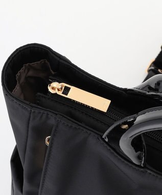 LA BAGAGERIE ツイルナイロン×エナメル リュックサック ブラック