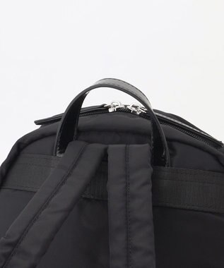 LA BAGAGERIE エナメルアクセントリュックサック ブラック