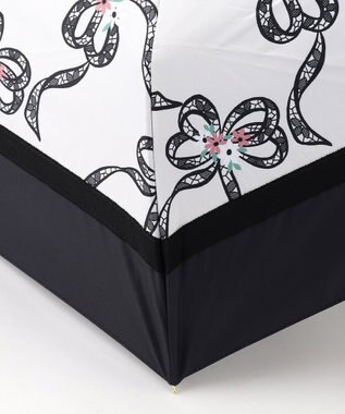 TOCCA 【晴雨兼用】【UVカット99.9%以上・撥水・遮光率99.9%・ミニ傘袋バッグ付き】SHAKE RIBBONS UMBRELLA 折り畳み傘 アイボリー系