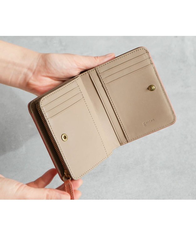 genten マルチカットワークミニ 2つ折り財布 コーラルピンク