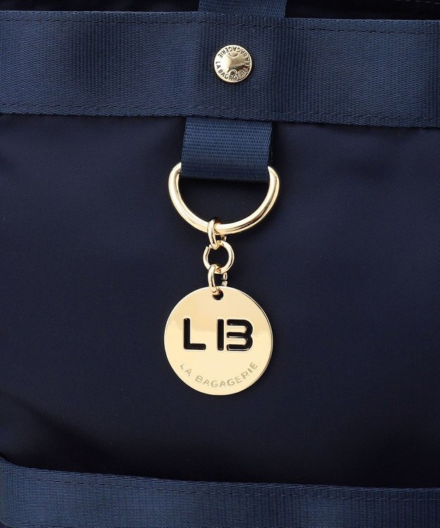 LA BAGAGERIE チャーム付き　ナイロンリュック ネイビー