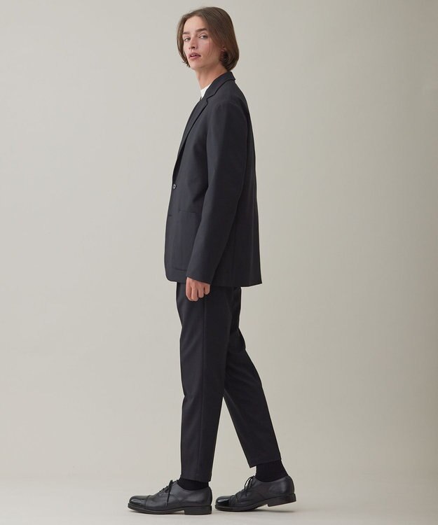 UNFILO MENS フレキシブルウェア テーパードパンツ  [23年秋冬商品] ブラック