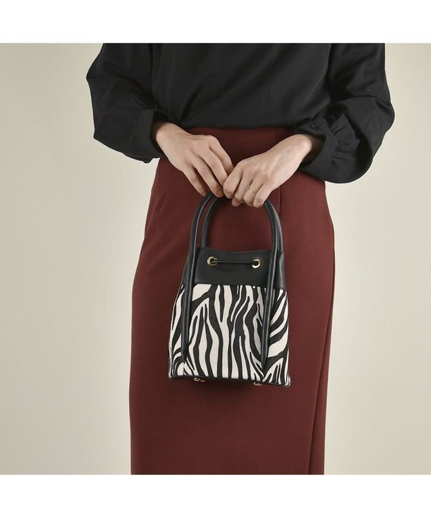 LA BAGAGERIE カウヘアー2WAYバケットバッグ ゼブラ