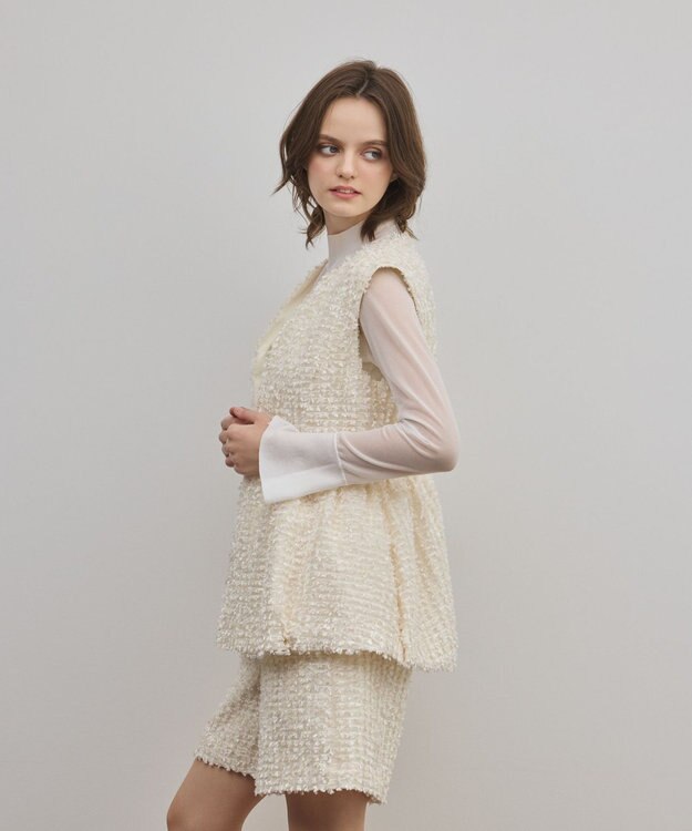 GRACE CONTINENTAL カットジャガードペプラムジレ キナリ